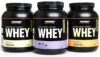 Diferentes tipos de whey protein: concentrado, isolado e hidrolisado em potes com suas características nutricionais